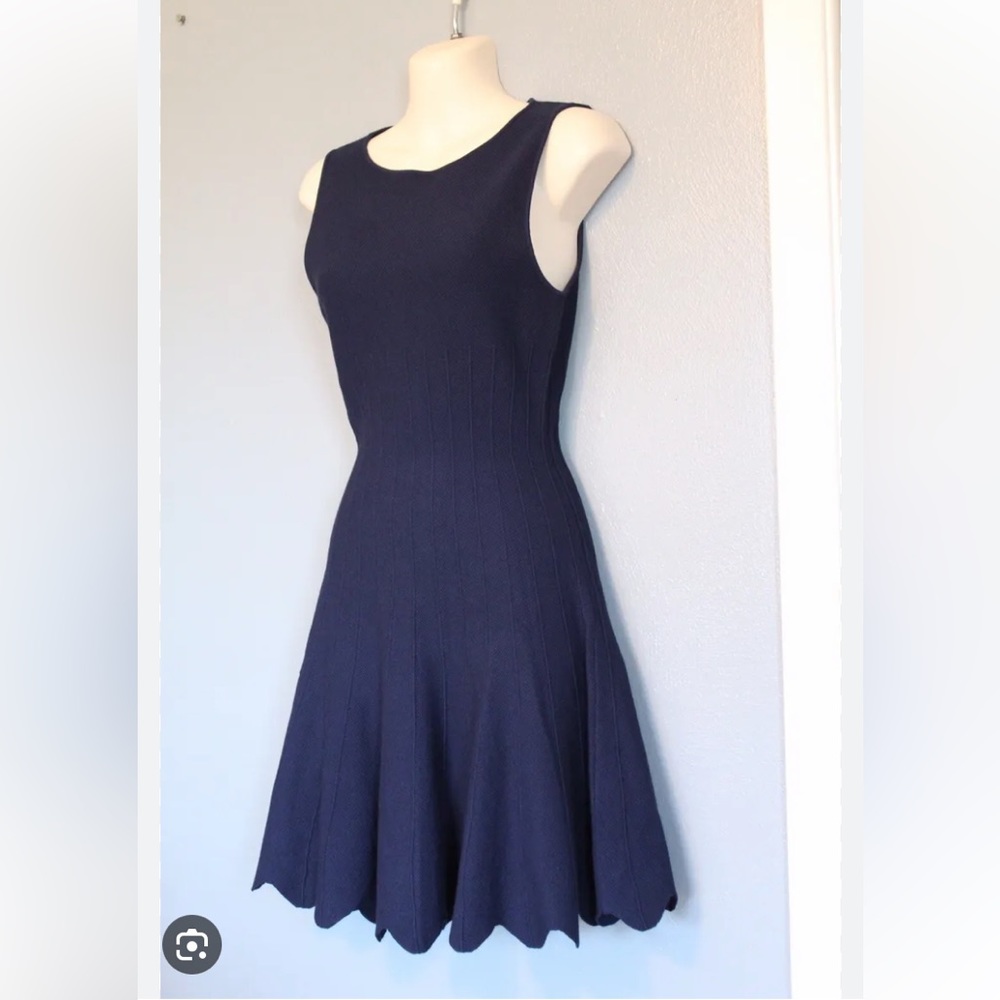 Alice + Olivia sleeveless navy blue knit dress.